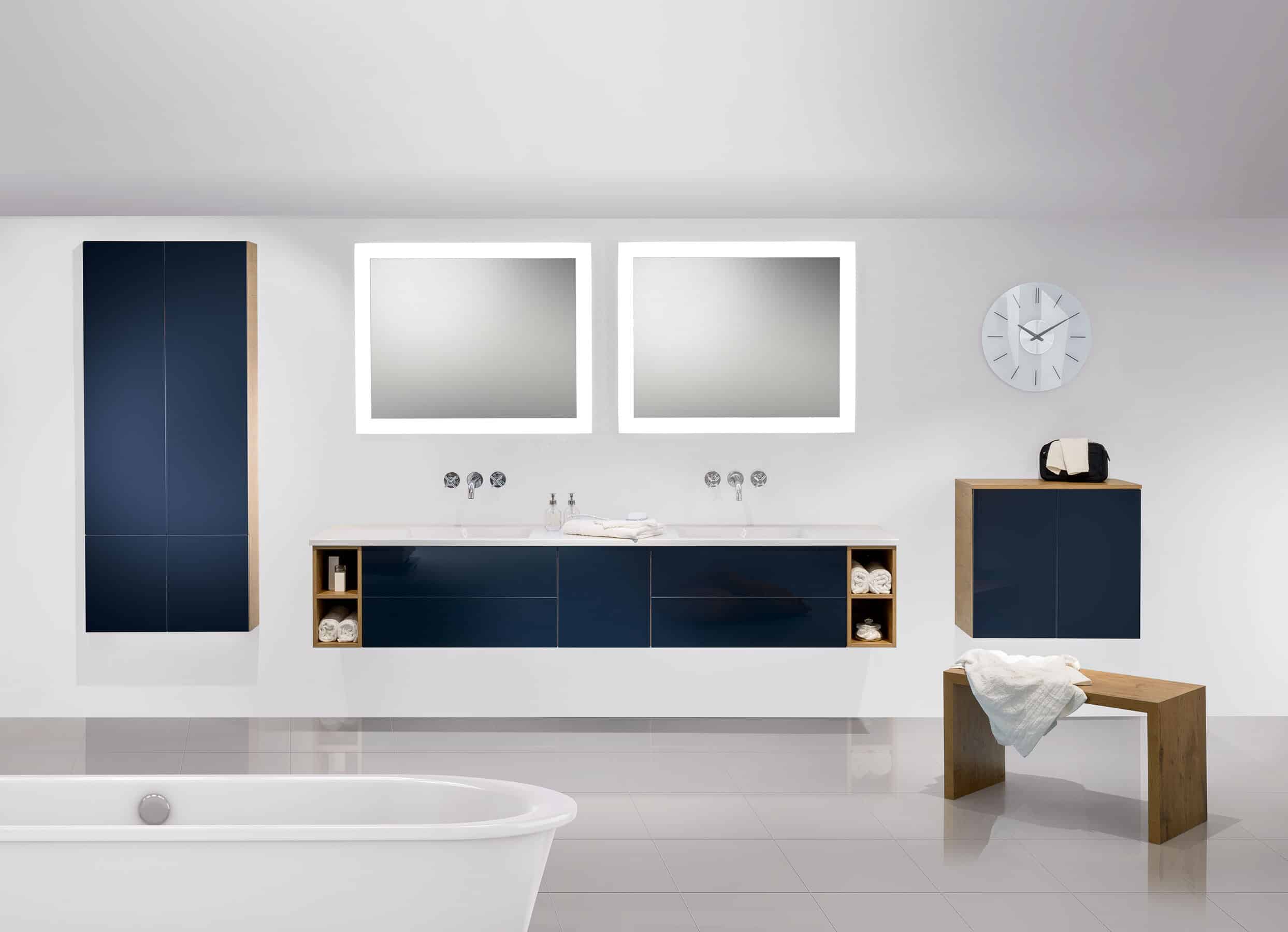 Badea bathroom vanity includes modern design features like these innovative basins and storage.
